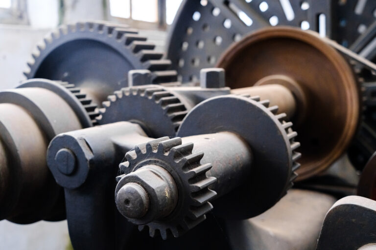 Old machinery from the 19th century to treat metal, exhibited in a museum.